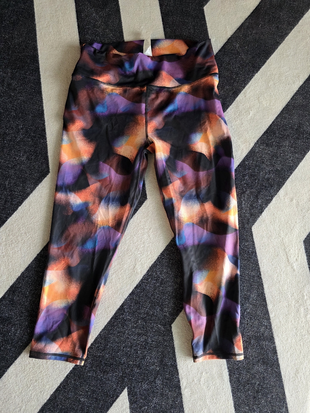 Fabletics Powerhold Black Leggings with Orange and Purple Abstract Print
